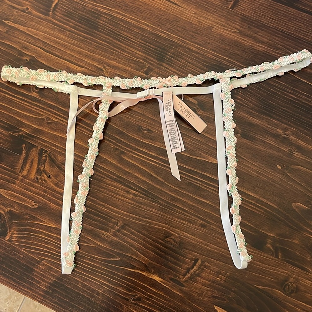 Victoria’s Secret flower detail, garter belt.